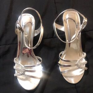 Elegant Silver Heels with Strappy Design and Ankle Strap
